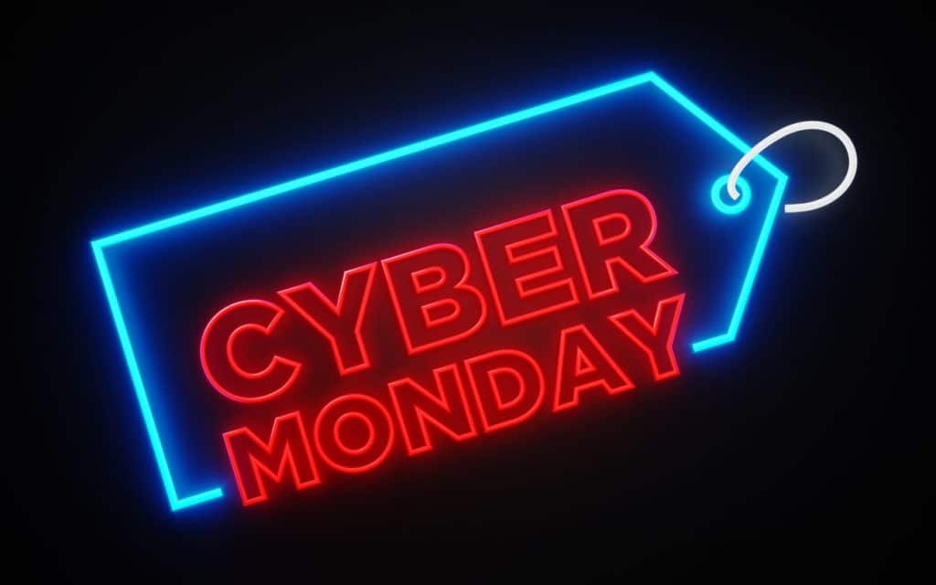 a neon sign written cyber monday on it